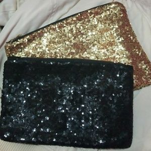 Get them both..Glitter clutch black and sliver